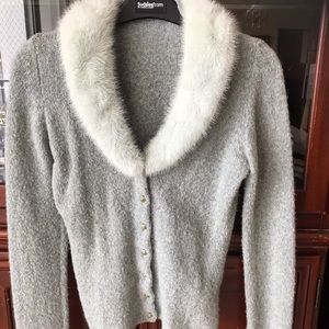 Genuine fur collar, wool sweater, mint green.